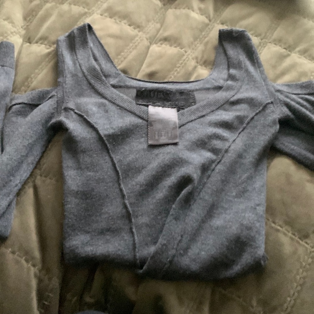 Guess top , good condition, cut shoulder